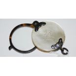 A WHITE METAL MOUNTED MOTHER OF PEARL AND TORTOISESHELL MAGNIFYING GLASS, THE COVER INSCRIBED 1837