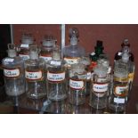 A COLLECTION OF FOURTEEN ASSORTED APOTHECARY BOTTLES AND STOPPERS