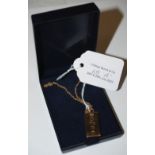 A 9CT GOLD INGOT SUSPENDED ON 9CT GOLD CHAIN, GROSS WEIGHT 10.5 GRAMS