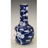 CHINESE PORCELAIN BLUE AND WHITE BOTTLE VASE DECORATED WITH PRUNUS ON A CRACKED ICE GROUND, FOUR