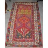 PERSIAN PRAYER RUG, THE RECTANGULAR FIELD WITH MIHRAB SHAPED PANEL ENCLOSING STYLISED FOLIATE