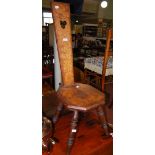 AN EARLY 20TH CENTURY POKER WORK SPINNING CHAIR