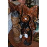 TRIBAL ART: PAIR OF CARVED WOOD FIGURES AND TWO OTHER CARVED WOOD STANDING FIGURES