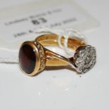 A YELLOW METAL AND GARNET CABOCHON SINGLE STONE RING STAMPED 18CT TOGETHER WITH A YELLOW AND WHITE