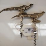 TWO NOVELTY CORKSCREWS BOTH MOUNTED WITH SILVER COCK PHEASANTS, ONE WITH INLAID GLASS EYES