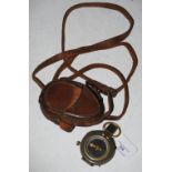 GREAT WAR INTEREST, A 1917 MILITARY ISSUE FIELD COMPASS WITH ORIGINAL BROWN LEATHER CASE