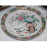LATE 19TH/ EARLY 20TH CENTURY FAMILLE ROSE PORCELAIN CHARGER DECORATED WITH RICKSHAW AND PEONY, 37CM