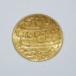 MIDDLE-EASTERN YELLOW METAL COIN, 12.3 GRAMS
