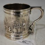 LONDON SILVER CHRISTENING MUG OF CYLINDRICAL FORM EMBOSSED WITH FIGURES AND DISTANT TOWNSCAPE, 5.6