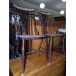 PAIR OF EARLY 20TH CENTURY STAINED BEECH SIDE CHAIRS WITH VERTICAL SPINDLE BACKS