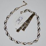 A 9CT GOLD GATE LINK BRACELET 17.2 GRAMS, TOGETHER WITH A YELLOW METAL NECKLACE STAMPED '9CT' 8.3