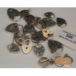 A COLLECTION OF ASSORTED SILVER AND WHITE METAL HEART SHAPED AND CIRCULAR SHAPED LOCKETS