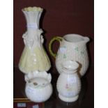 THREE PIECES OF BELLEEK PORCELAIN TO INCLUDE A LEAF MOULDED VASE, SHAMROCK PATTERN JUG, TIED SACK