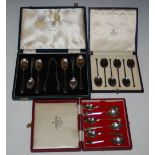 A CASED SET OF SIX SHEFFIELD SILVER TEASPOONS AND TONGS, TOGETHER WITH TWO OTHER CASED SETS OF SIX