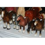 THREE ASSORTED BESWICK HORSES AND TWO MELBA WARE HORSES