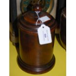 A 19TH CENTURY TURNED TREEN CYLINDRICAL JAR AND COVER
