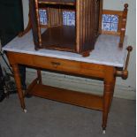 A VICTORIAN PINE WASHSTAND WITH MARBLE TOP AND TILED UPSTAND