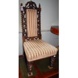A 19TH CENTURY MAHOGANY SIDE CHAIR WITH SPIRAL CARVED DETAIL AND UPHOLSTERED BACK AND SEAT