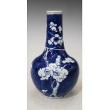 CHINESE BLUE AND WHITE PORCELAIN BOTTLE VASE DECORATED WITH PRUNUS BLOSSOM ON A CRACKED ICE