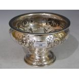 EDINBURGH SILVER FOOTED BOWL IN THE ART NOUVEAU STYLE EMBOSSED WITH STYLISED FLOWERS AND FOLIAGE