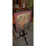 A 19TH CENTURY MAHOGANY POLESCREEN WITH RECTANGULAR NEEDLEWORK AND EMBROIDERED PANEL DEPICTING