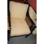 A REGENCY STYLE MAHOGANY BERGERE TWO SEAT SOFA AND MATCHING ARMCHAIR WITH LOOSE CUSHIONS AND