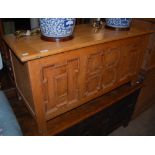 A BLONDE OAK COFFER