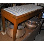 A MAHOGANY DUET PIANO STOOL WITH HINGED UPHOLSTERED SEAT