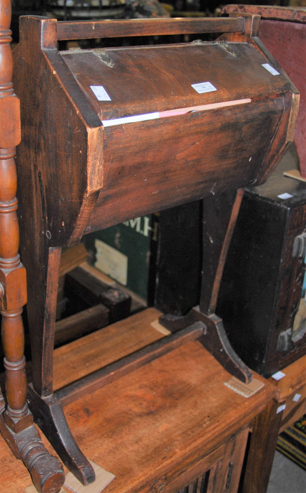 A STAINED WOOD SEWING CADDY ON STAND TOGETHER WITH A STAINED PINE RECTANGULAR STOOL