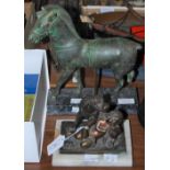 A BRONZE FIGURE OF DOG AND RECUMBENT CHILD SIGNED 'WJ' INSCRIBED AROUND BRONZE BASE, MOUNTED ON