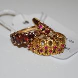 AN 18CT GOLD AND RUBY TEN STONE RING TOGETHER WITH A 9CT GOLD AND GARNET FIVE STONE RING, AND