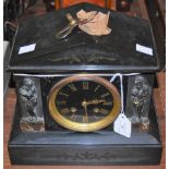A VICTORIAN POLISHED SLATE ARCHITECTURAL FORM MANTLE CLOCK WITH ROMAN NUMERAL DIAL