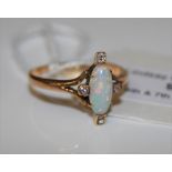 A YELLOW METAL, OPAL AND DIAMOND SET DRESS RING, STAMPED '18CT'