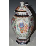 A SAMSON PORCELAIN HEXAGONAL-SHAPED JAR AND COVER WITH ARMORIAL DECORATION IN THE CHINESE TASTE