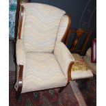 AN EDWARDIAN MAHOGANY WING ARMCHAIR WITH UPHOLSTERED BACK, ARMS AND SEAT TOGETHER WITH A SMALL