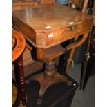 A 19TH CENTURY MAHOGANY WORK TABLE, WITH HINGED TOP OPENING TO A FITTED INTERIOR ON FOLIATE CARVED