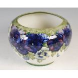 A MOORCROFT POTTERY JARDINIERE, DECORATED WITH PANSIES ON A WHITE GROUND, IMPRESSED MARKS, SIGNED IN