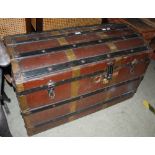 A GROUP OF THREE ASSORTED TRUNKS TO INCLUDE A WOODEN AND BRASS BOUND DOME TOP TRUNK, TOGETHER WITH