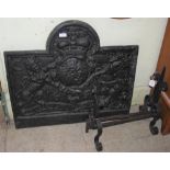 A CAST IRON FIRE BACK, WITH LION AND UNICORN COAT OF ARMS, DATED 1664 TOGETHER WITH A PAIR OF CAST