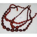 THREE ASSORTED RED AMBER TYPE BEAD GRADUATED NECKLACES, GROSS WEIGHT 159 GRAMS