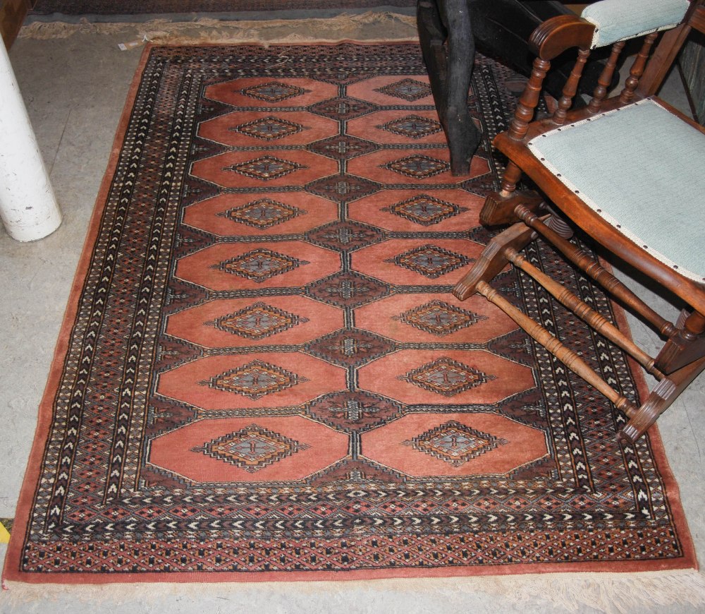 A GROUP OF FIVE ASSORTED VARYING STYLE RUGS