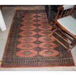 A GROUP OF FIVE ASSORTED VARYING STYLE RUGS