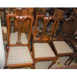 A SET OF FOUR EARLY 20TH CENTURY MAHOGANY DINING CHAIRS WITH FLORAL UPHOLSTERED DROP-IN SEATS