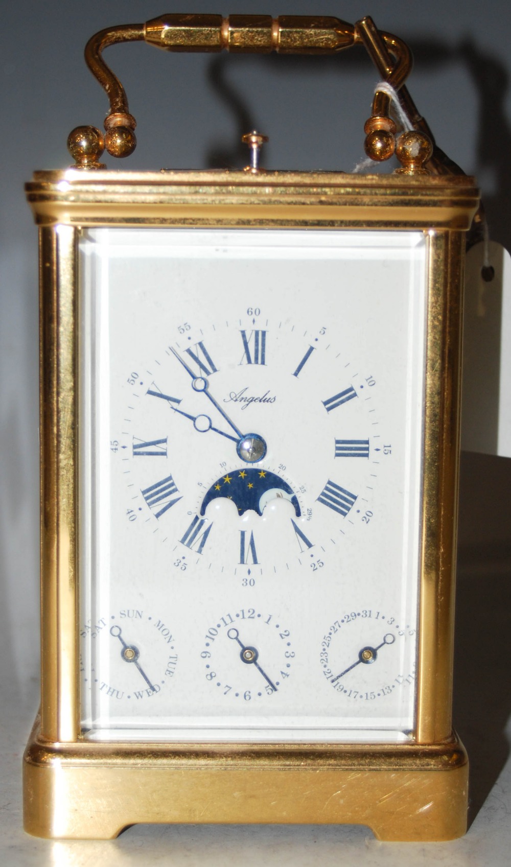 AN ANGELUS REPEATING CARRIAGE CLOCK WITH MOON PHASE, DAY ALARM AND DATE COMPLICATIONS