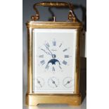 AN ANGELUS REPEATING CARRIAGE CLOCK WITH MOON PHASE, DAY ALARM AND DATE COMPLICATIONS