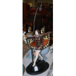A GOLDSCHEIDER POTTERY FIGURE OF THE BUTTERFLY GIRL, MOUNTED AS A TABLE LAMP AND SHADE
