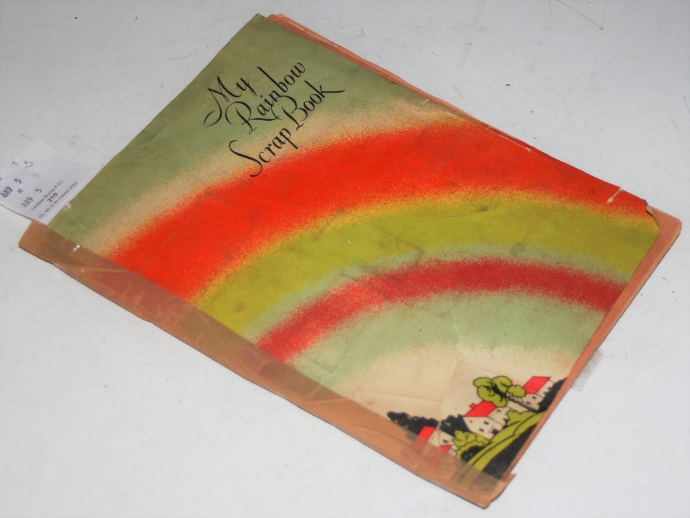 A VINTAGE RAINBOW SCRAP BOOK, CONTAINING ASSORTED SOUVENIR SCRAPS, FOOTBALLERS, FILM STARS,