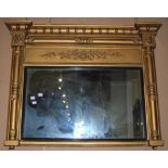 A 19TH CENTURY GILTWOOD OVER MANTLE MIRROR WITH BALL SET FRIEZE AND RECTANGULAR BEVELLED MIRROR