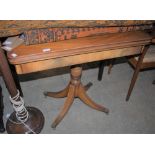 A REPRODUCTION REGENCY STYLE MAHOGANY PEDESTAL GAMES/ CARD TABLE