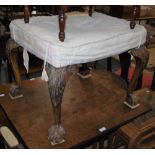 A LATE 19TH / EARLY 20TH CENTURY DRESSING TABLE STOOL ON FOUR CABRIOLE SUPPORTS WITH CLAW AND BALL